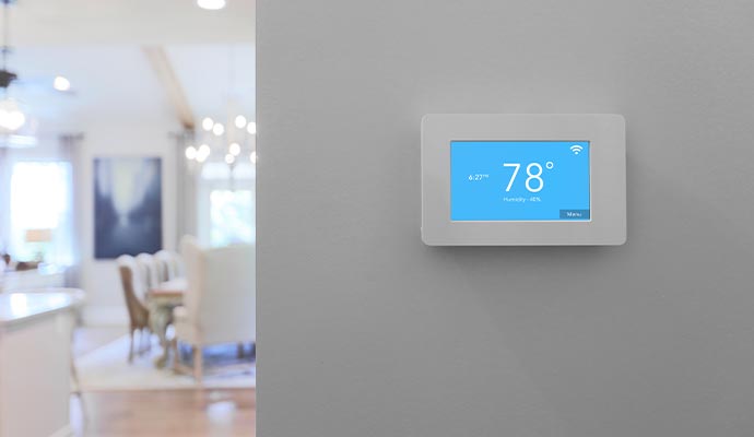 smart thermostat installed in a room