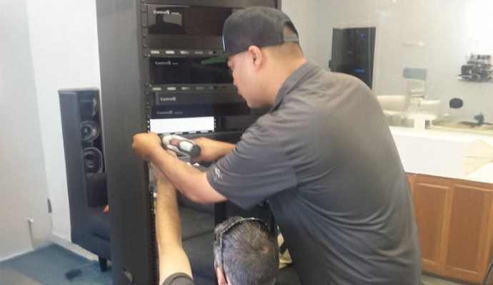 Professional person installing networking system