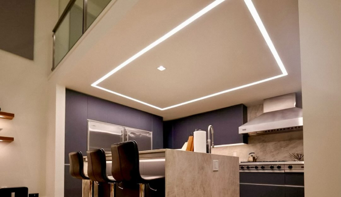 well-designed kitchen with linear-lighting on the celling