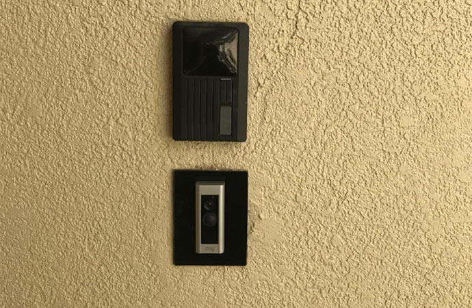 Smart doorbell installed with two-way camera for enhanced security.