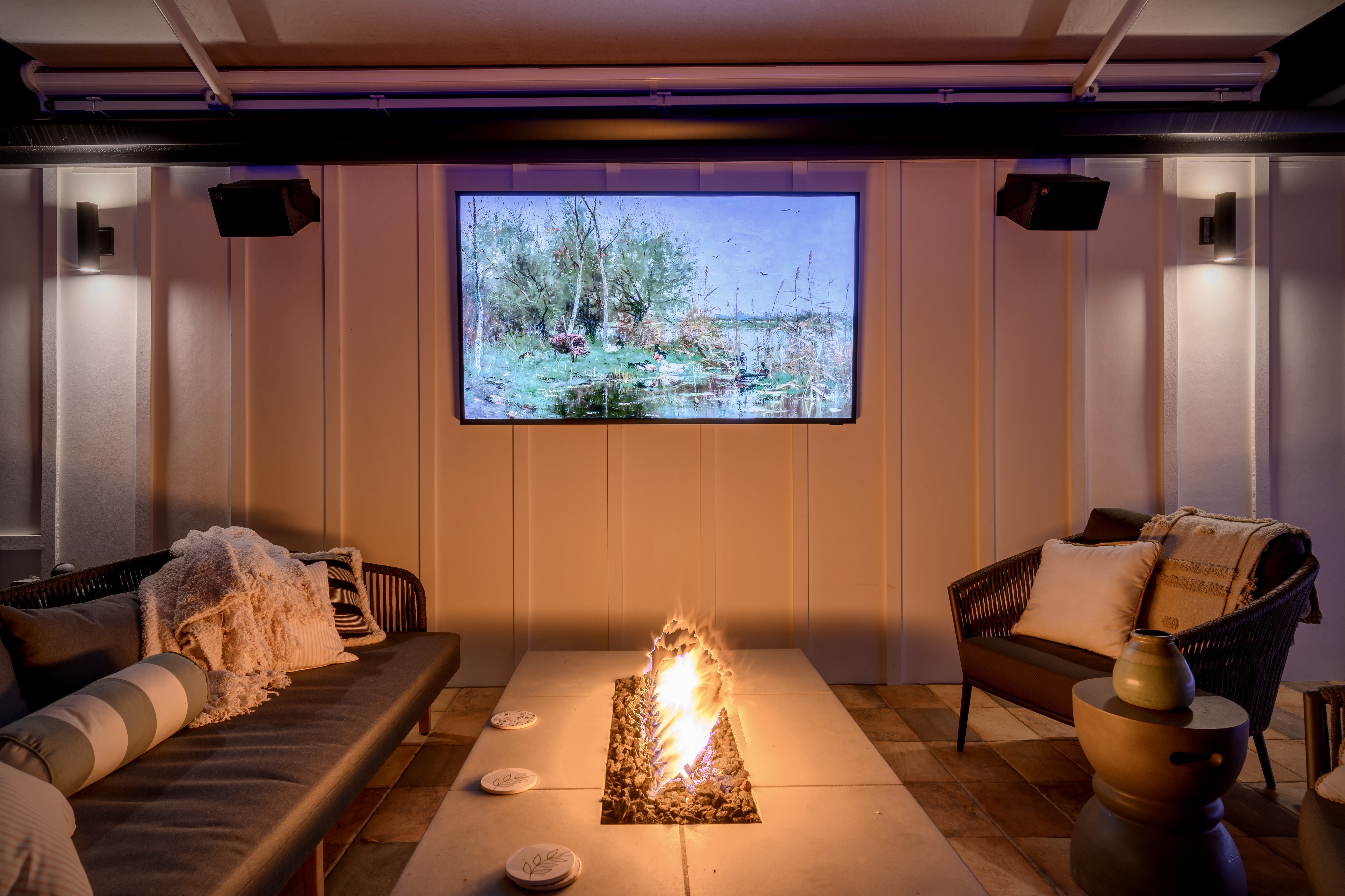 terrace weatherproof tv with ambisonic speakers on the sides